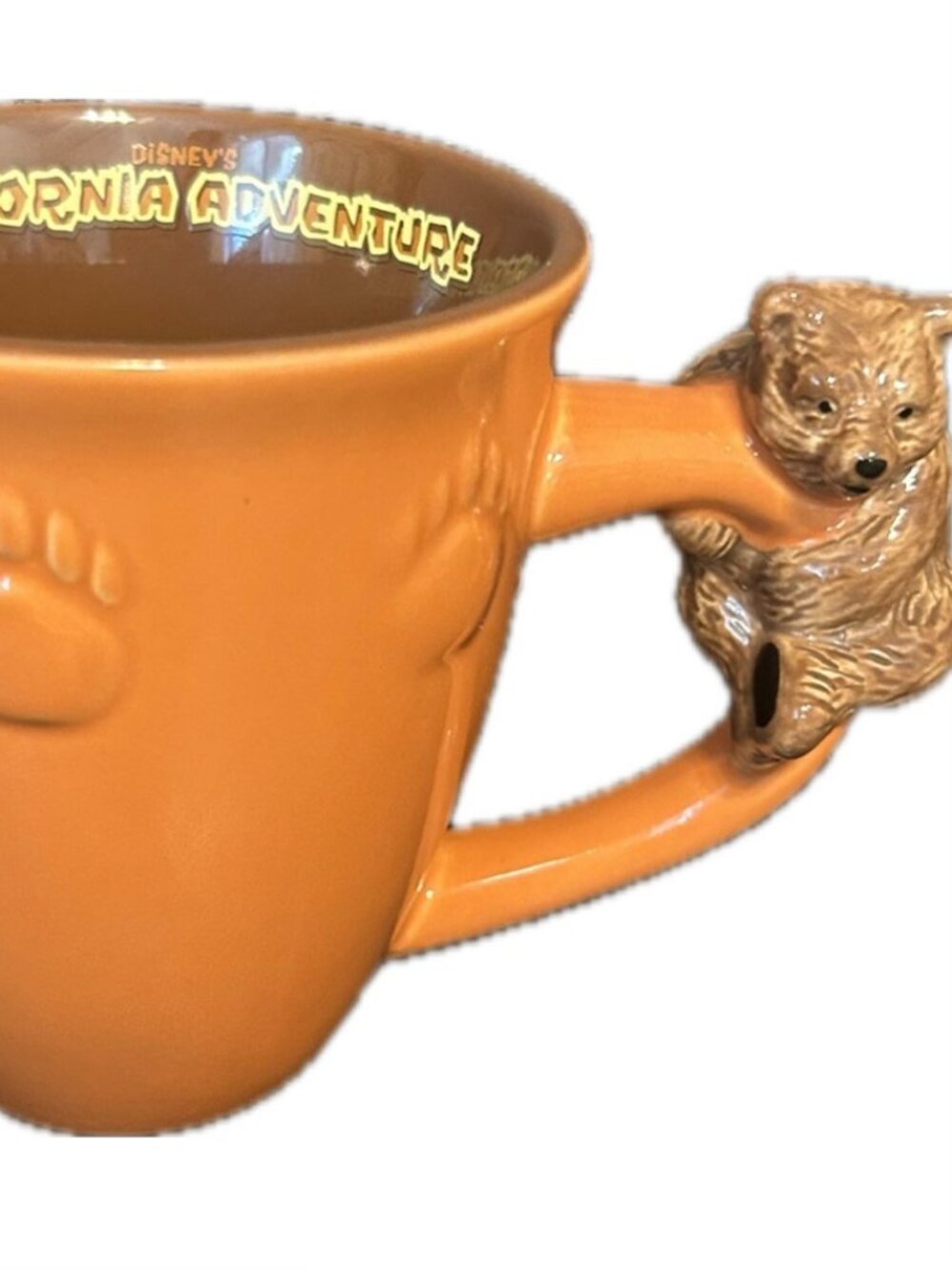 Disney California Adventure Park Ceramic Bear Handle Mug. Orange/Brown/Yellow